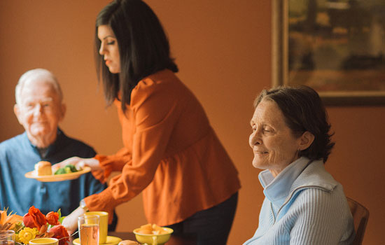 amenities-you-love-2 Senior residents being served lunch at Summerfield of Roseville Memory Care in Roseville, CA