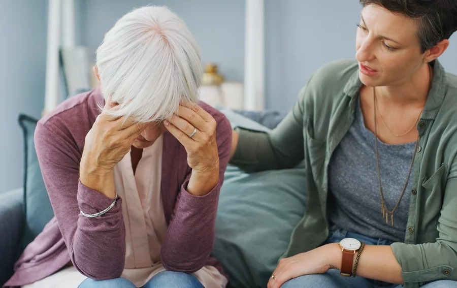 Senior mom, stress and daughter with support for mental health crisis